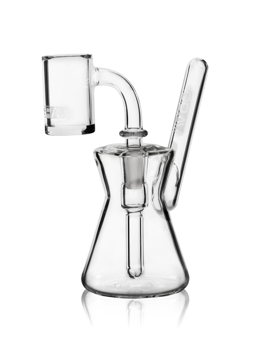 Clear glass hourglass-shaped mini bubbler rig